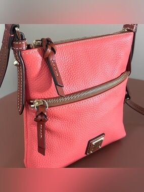 Dooney & Bourke Coral-Pink Pebbled Leather Crossbody with Brown Trim